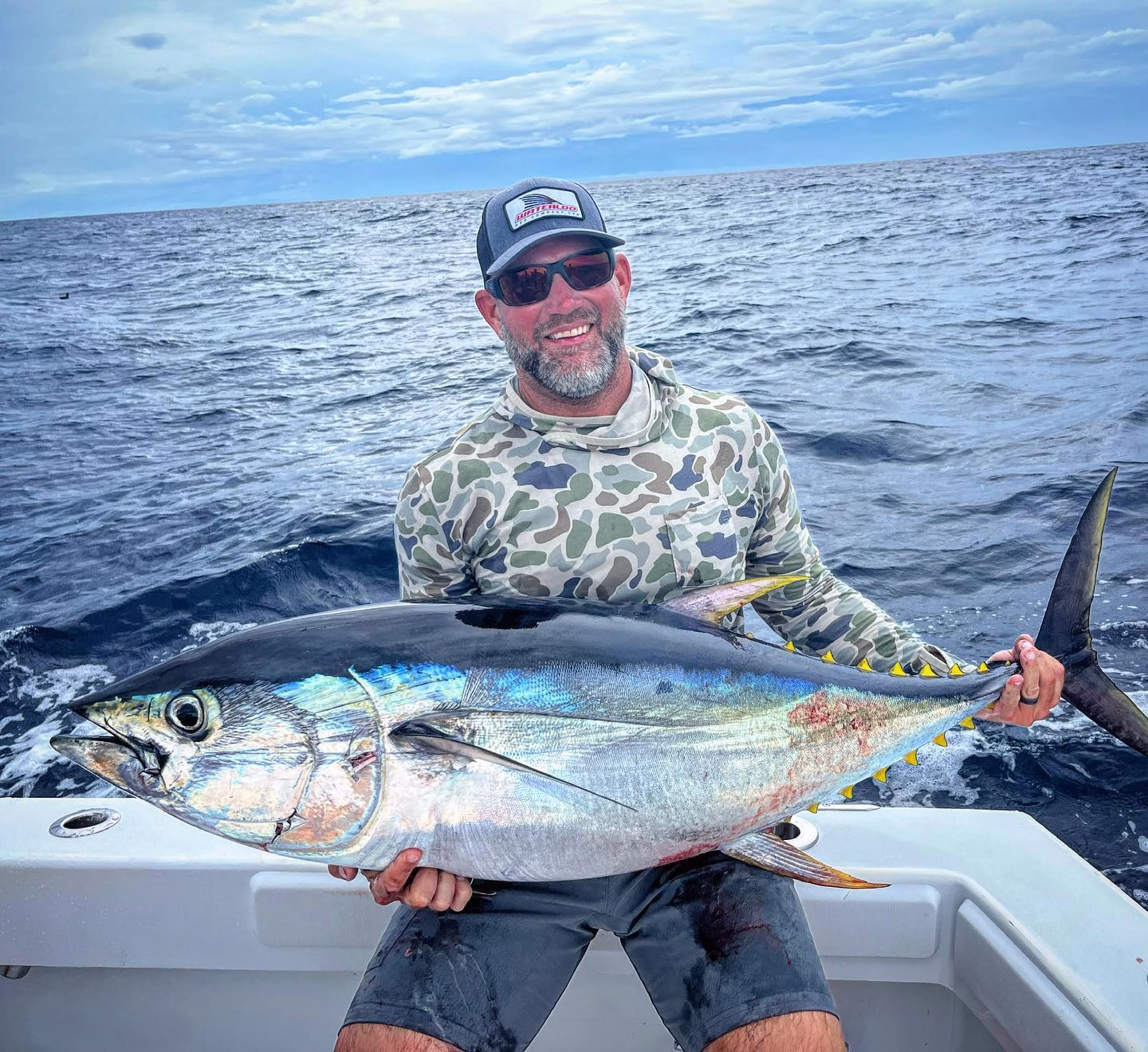 Angler holding Yellowfin Tuna after a Costa Rica fishing trip